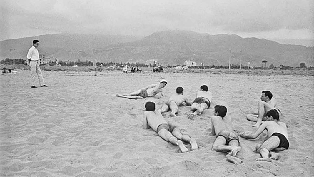 Pier Paolo Pasolini on the beach of Cinquale (Versilia), 1959 ©Archivio Fotografico Paolo Di Paolo